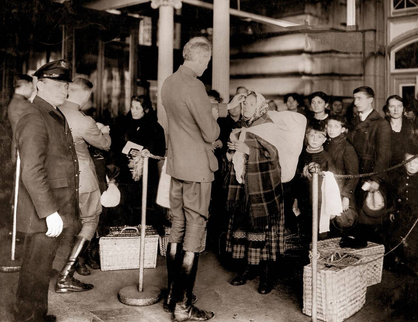 Public Health Service Officers Examining Immigrants At Ellis Island During The Spanish Flu Pandemic, 1918
