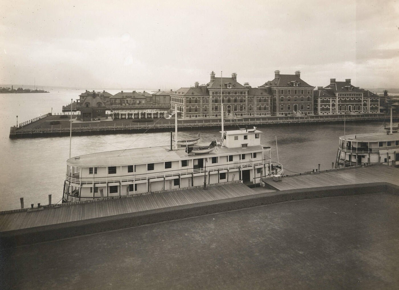 Ellis Island Buildings And Ferries At The Pier, 1902
