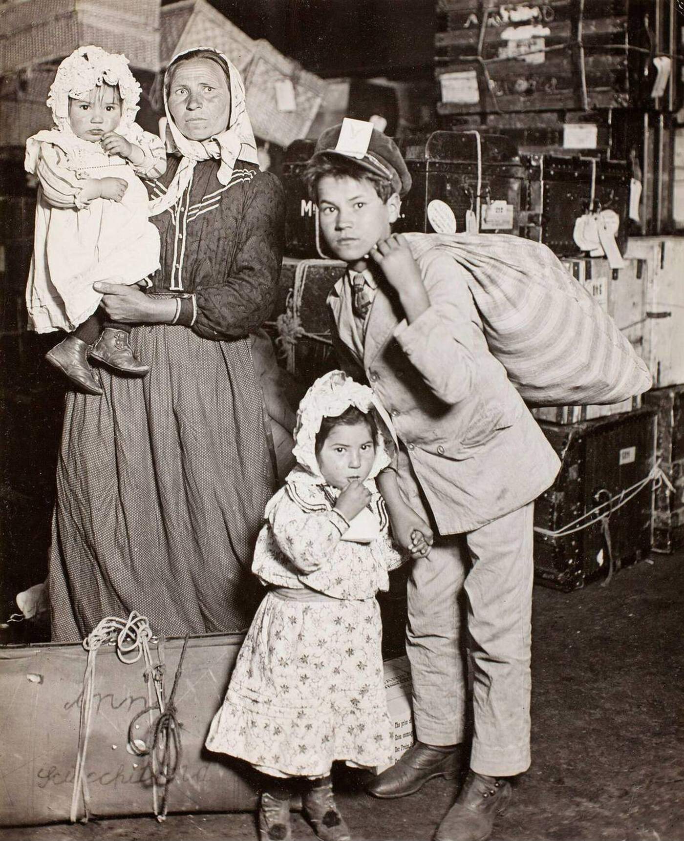 Italian Family Seeking Lost Baggage At Ellis Island, 1905
