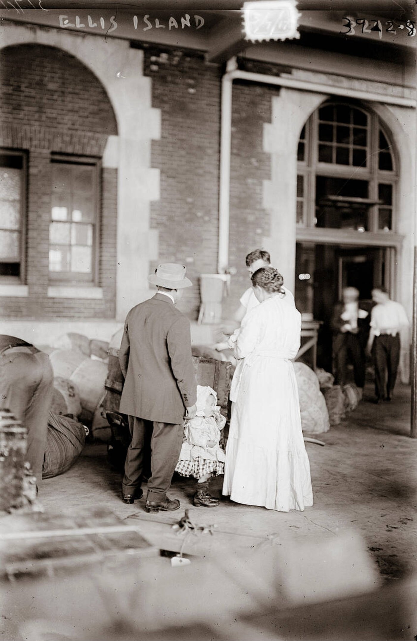 Immigrants Arriving At Ellis Island, 1910