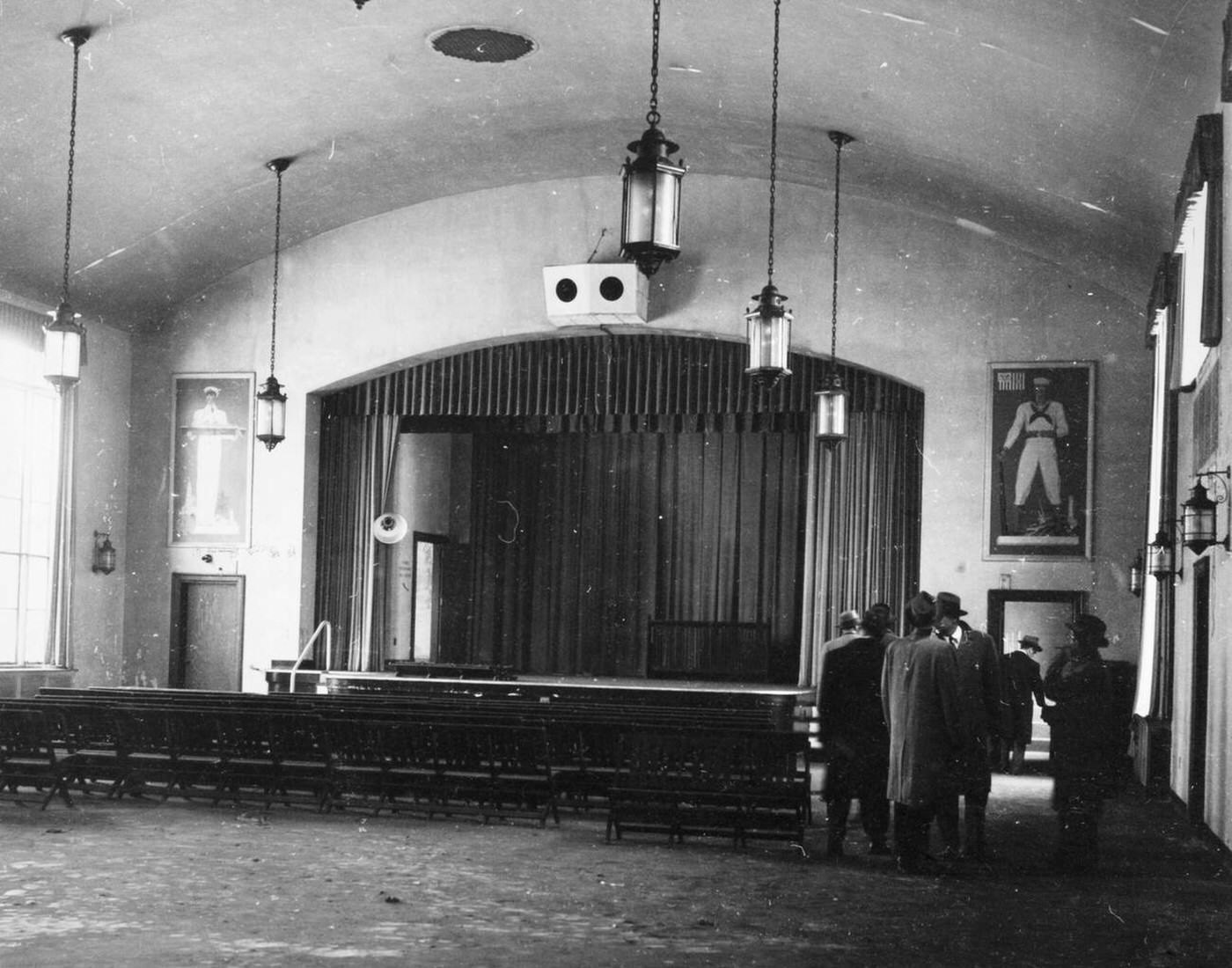 Prospective Buyers Viewing The Auditorium In The Recreation Building At Ellis Island, 1958