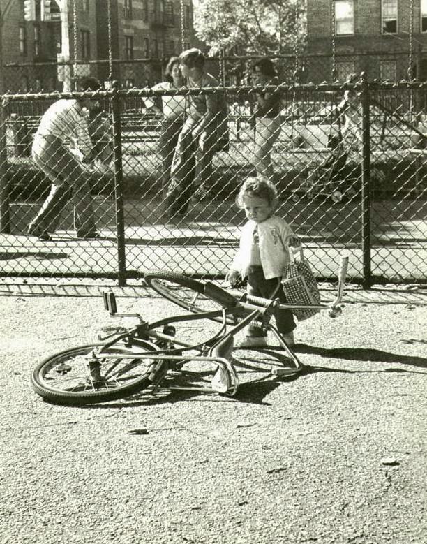 Girl Looks At Bicycle, Seth Low Park, Brooklyn, 1978.